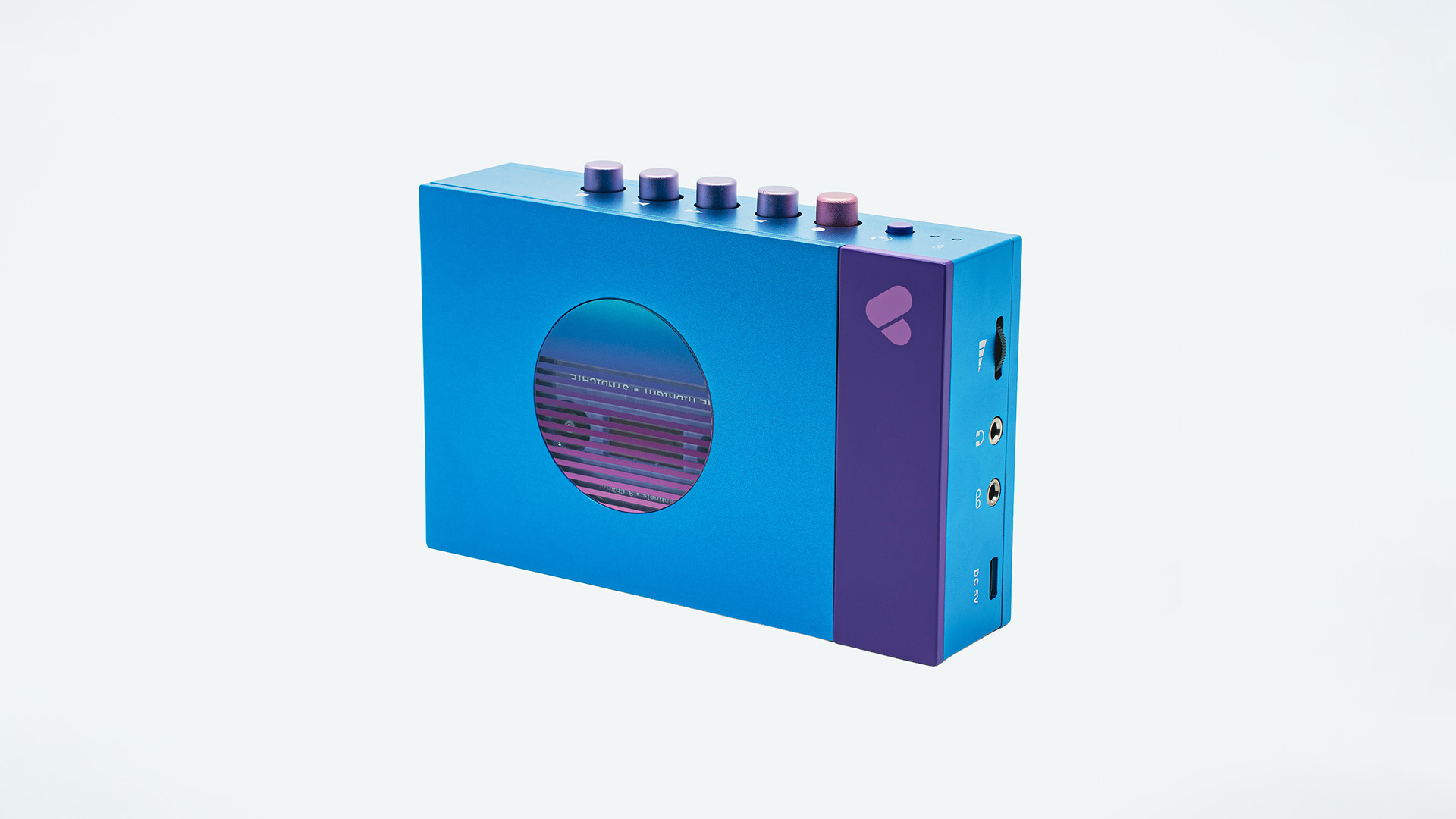 Blue and purple WE-001 The Midnight cassette player showing its controls and audio connections